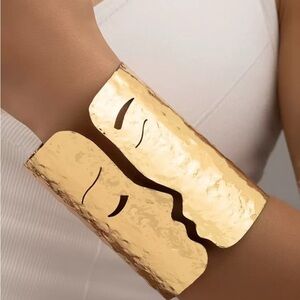 Gold Face Design Cuff Bracelet